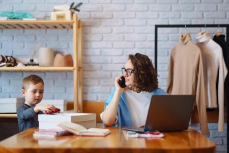 young mother works with little boy business woman talking phone discussing work issues 217236 11007 450x300 - Home